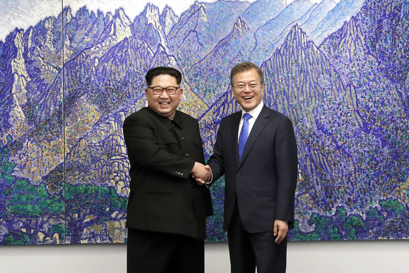 Kim Jong Un and South Korean President Moon Jae-in shake hands during the April 2018 inter-Korean summit, April 2018