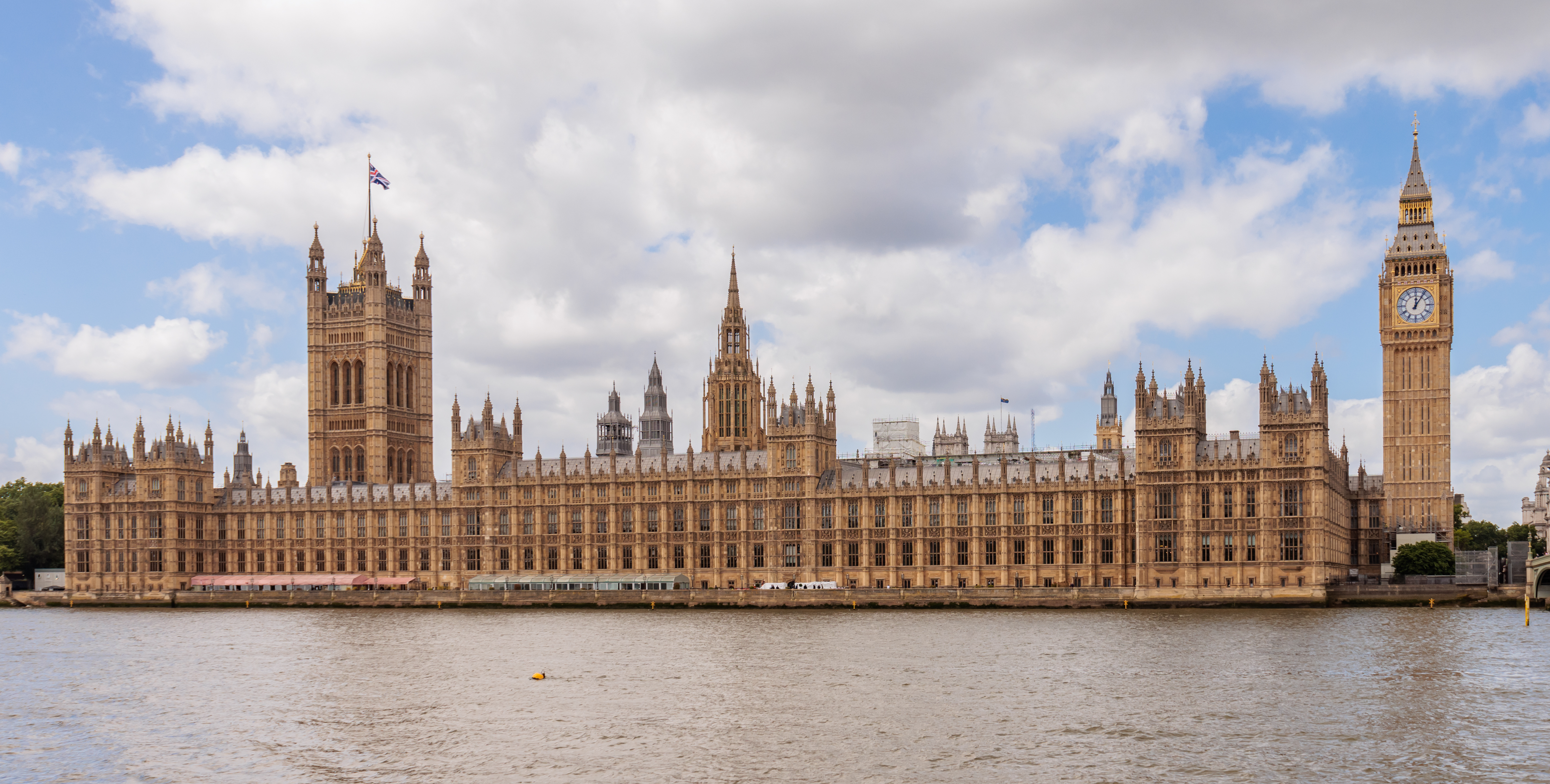 The Palace of Westminster in London is the seat of both houses of the Parliament of the United Kingdom.