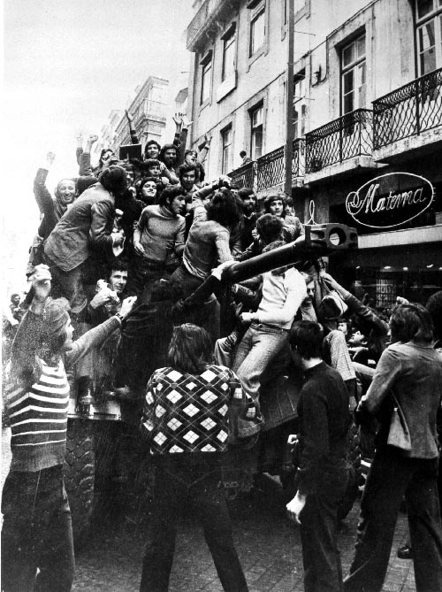 Crowds celebrate on a Panhard EBR armored car in Lisbon on April 25, 1974, during the Carnation Revolution. This largely bloodless coup ended the Estado Novo dictatorship.