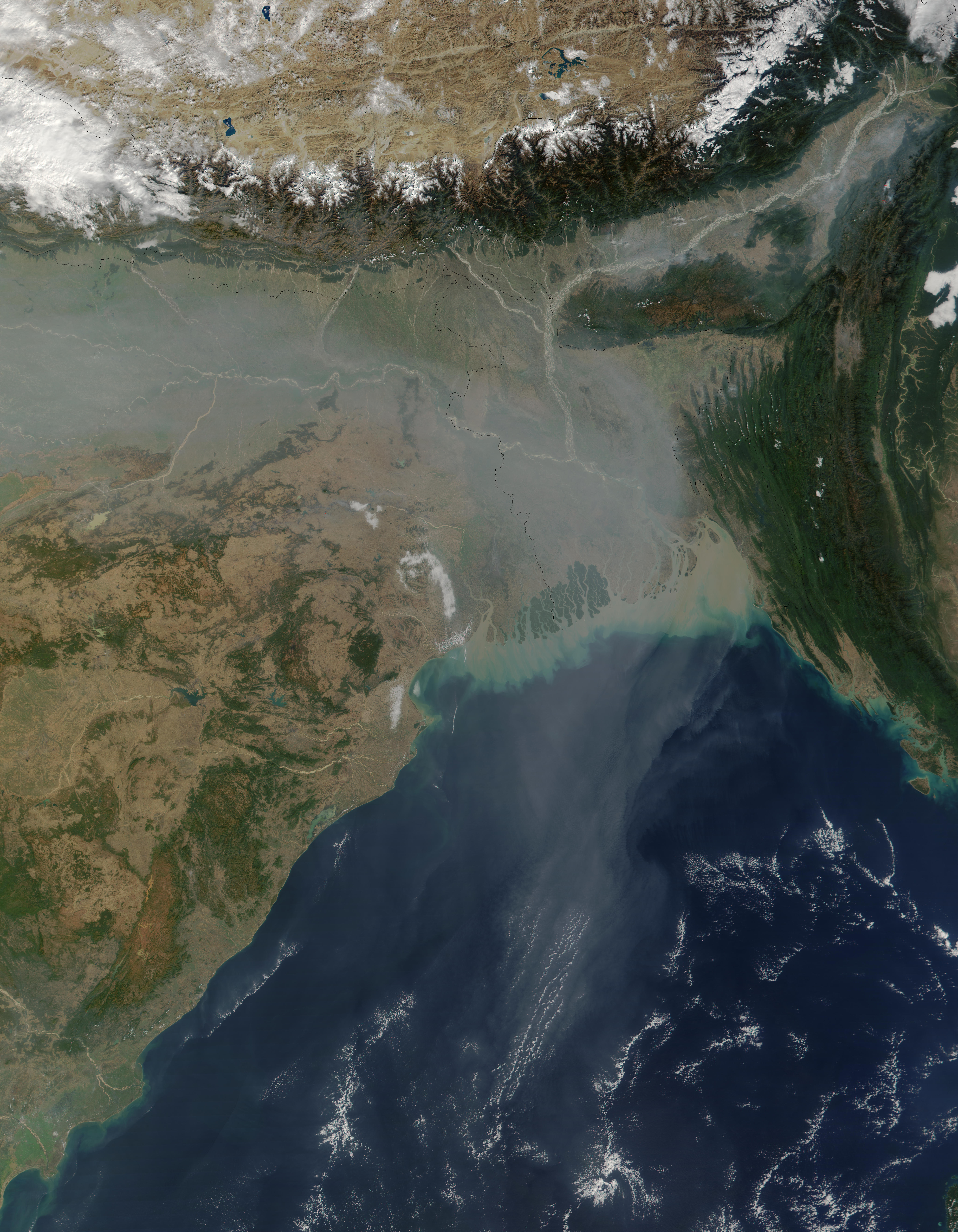 A satellite image showing aerosol pollution over Northern India, Bangladesh, and the Bay of Bengal.