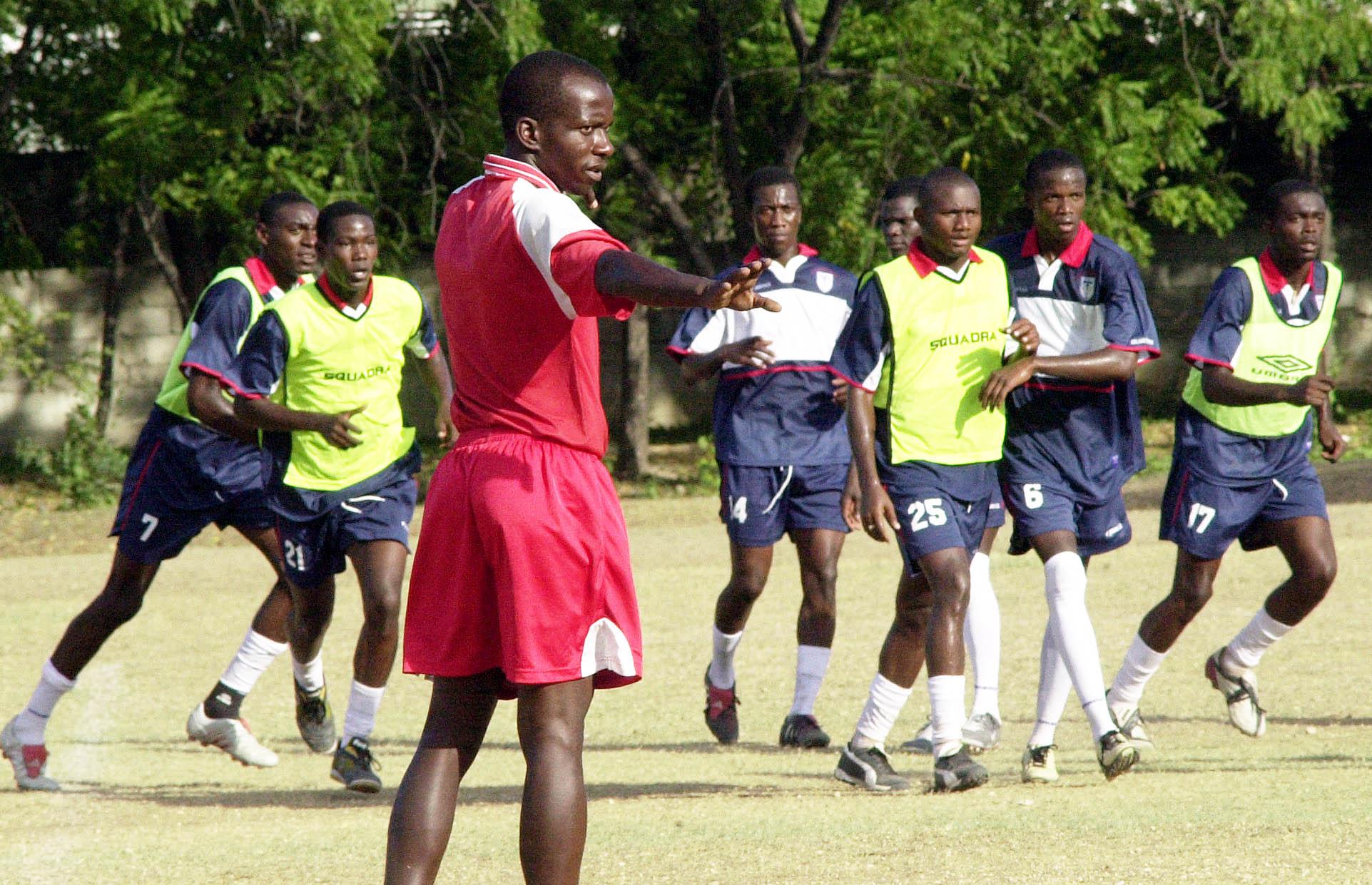 The Haiti national football team training in Port-au-Prince in 2004. Football is the most popular sport in the country.