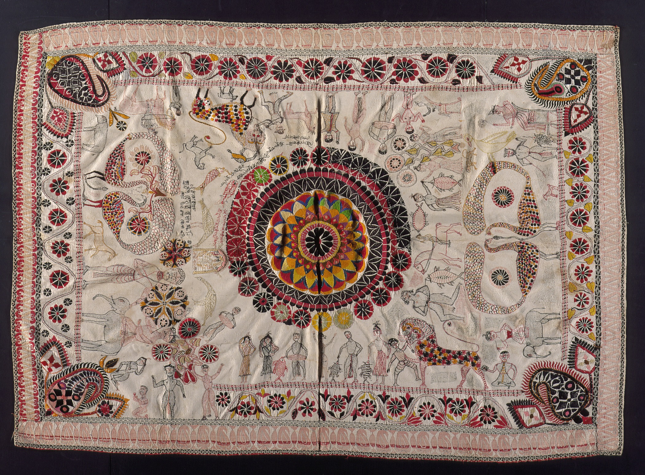 Embroidery on a Nakshi kantha (embroidered quilt), a centuries-old Bengali art tradition.