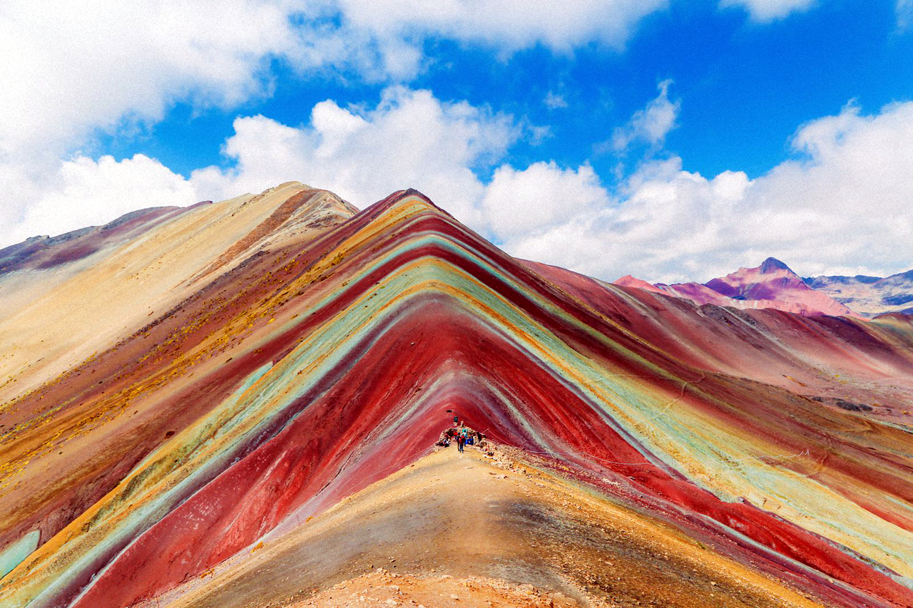 Vinicunca, also known as Rainbow Mountain, in the Cusco Region, showcasing colorful mineralogical formations.