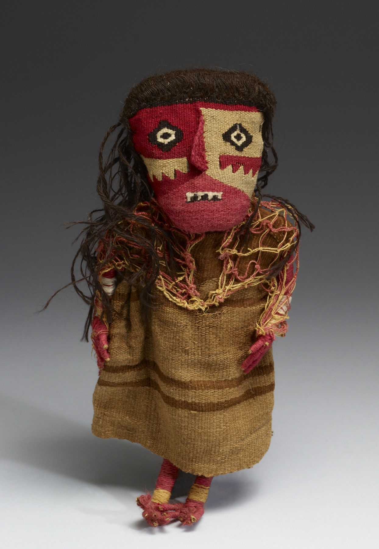 11th-15th century textile doll, Chancay culture, Walters Art Museum. Dolls are frequently found in the tombs of ancient Peru.