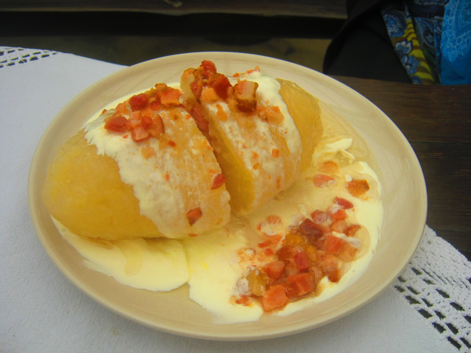 Cepelinai, potato-based dumplings typically filled with meat, curd cheese, or mushrooms, are a characteristic dish of Lithuanian cuisine.