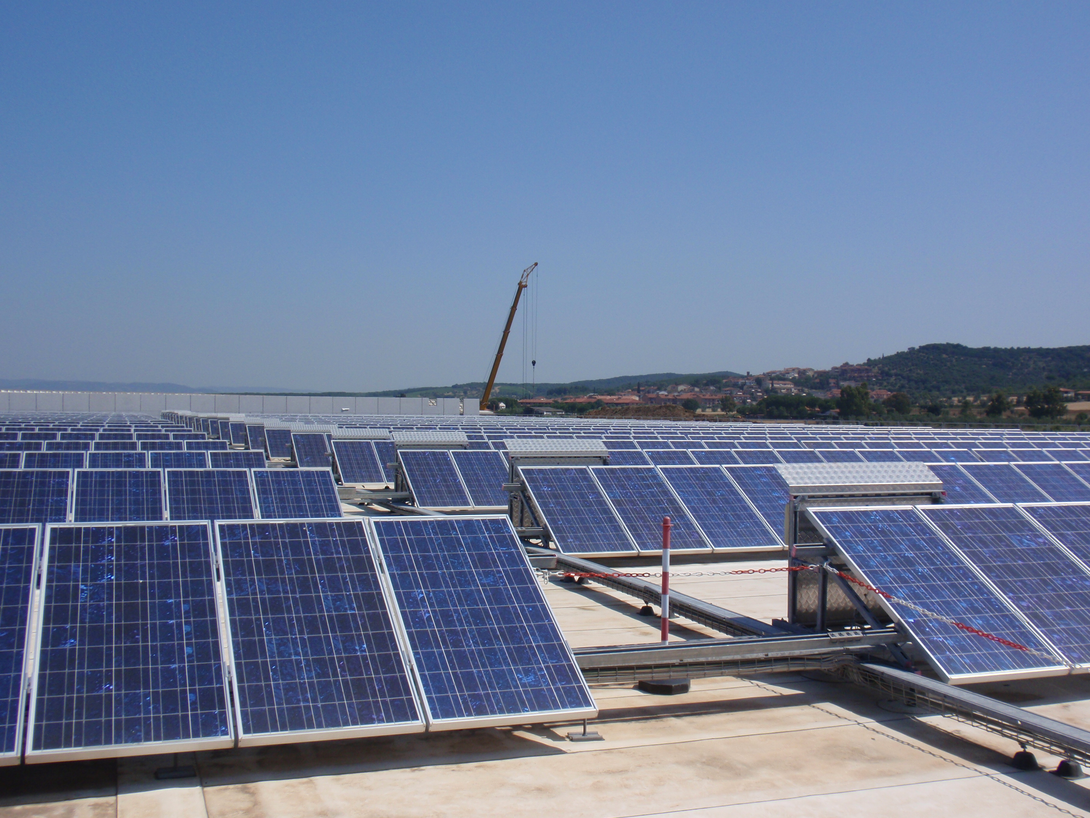 Solar panels in Piombino, Tuscany. Italy is a significant producer of renewable energy, particularly solar power.