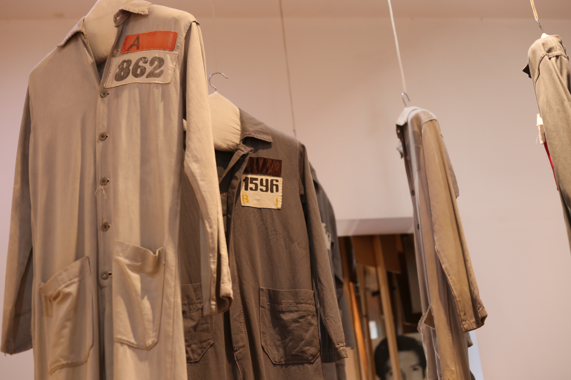 Garments worn by political prisoners during the dictatorship, exhibited at the Museum of Memory in Montevideo. This display underscores the human rights violations of the era.