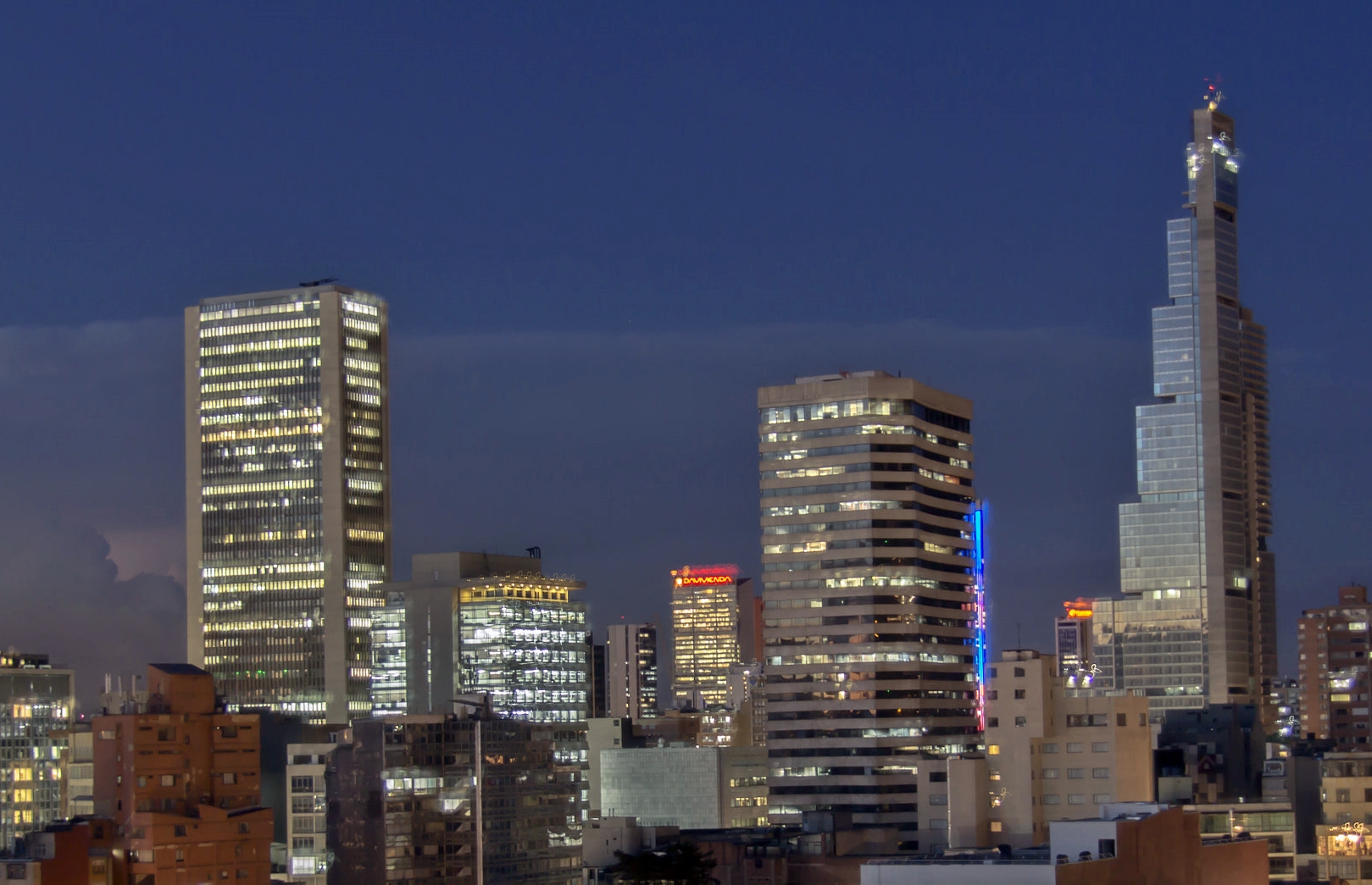 The skyline of Bogotá's skyscrapers, including the BD Bacatá, reflects Colombia's urban economic growth and modernization, though challenges in equitable wealth distribution and access to opportunities persist.