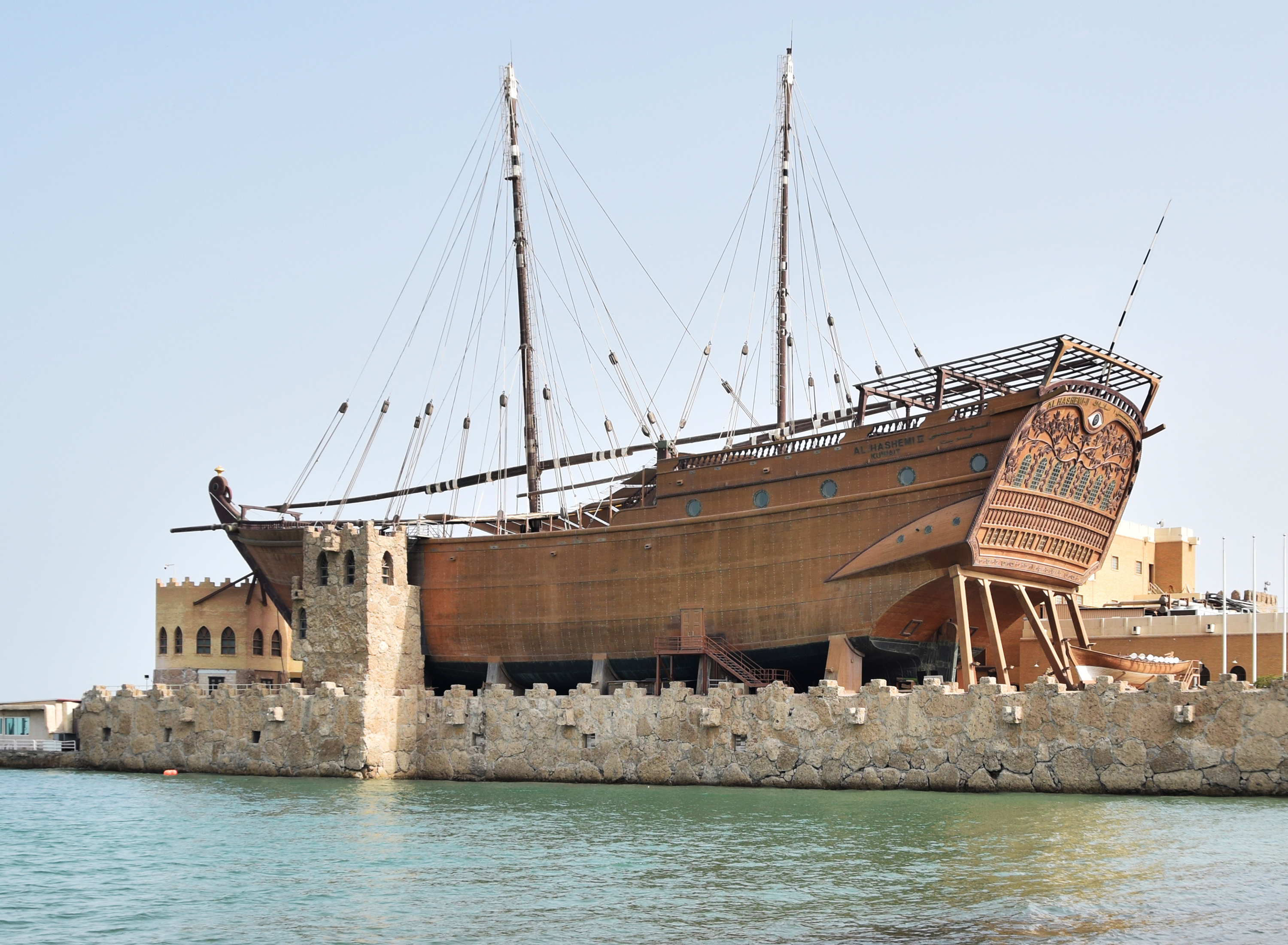 The Al-Hashemi-II, the largest wooden dhow ever built, located at the Radisson Blu Hotel in Kuwait, symbolizing the country's maritime heritage.
