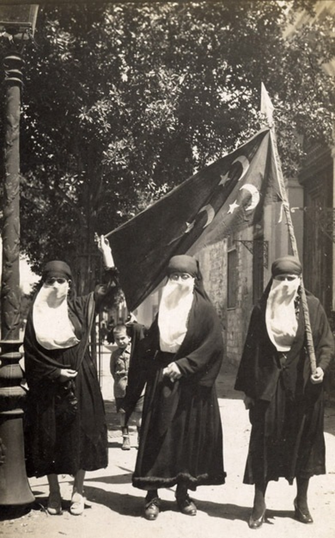 Female nationalists demonstrating in Cairo, 1919, highlighting women's participation in the struggle for independence.