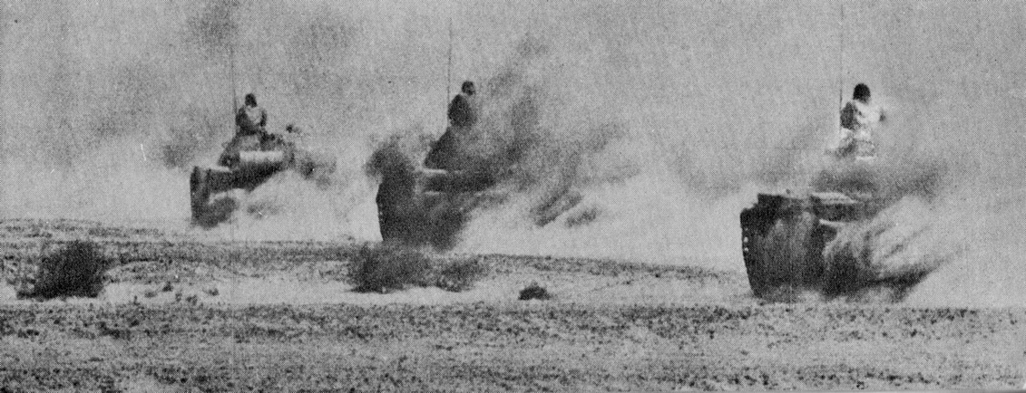 Egyptian tanks advancing in the Sinai desert during the Yom Kippur War, 1973. This war was a key event in Sadat's presidency.