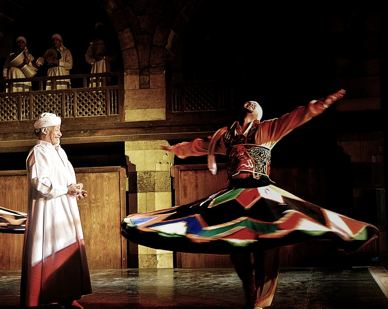 Tanoura dancers performing in Wekalet El Ghoury, Cairo. Tanoura is a form of Sufi-inspired folkloric dance.