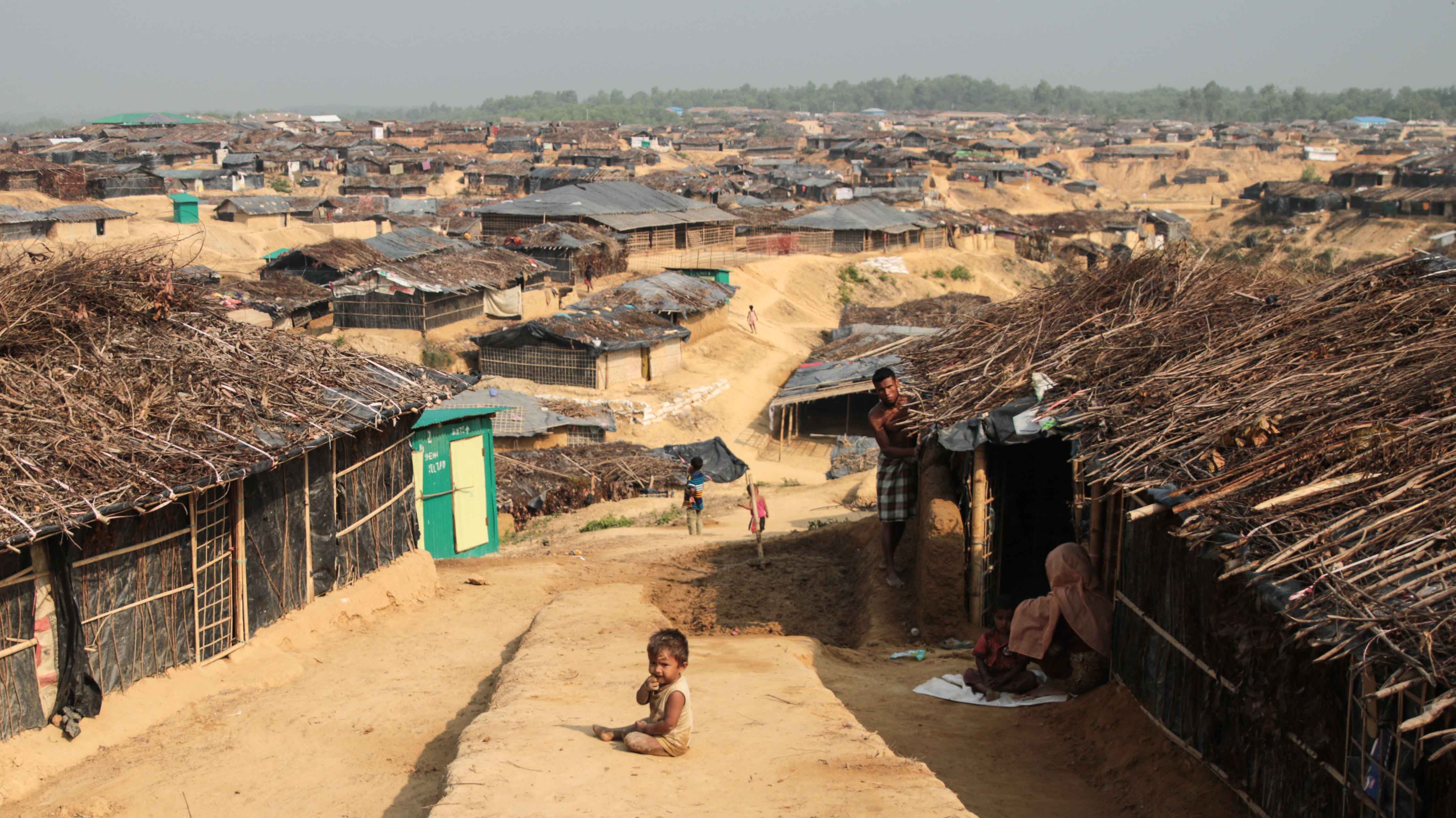 alt=Rohingya refugee camp in Kutupalong, Bangladesh, showing makeshift shelters.