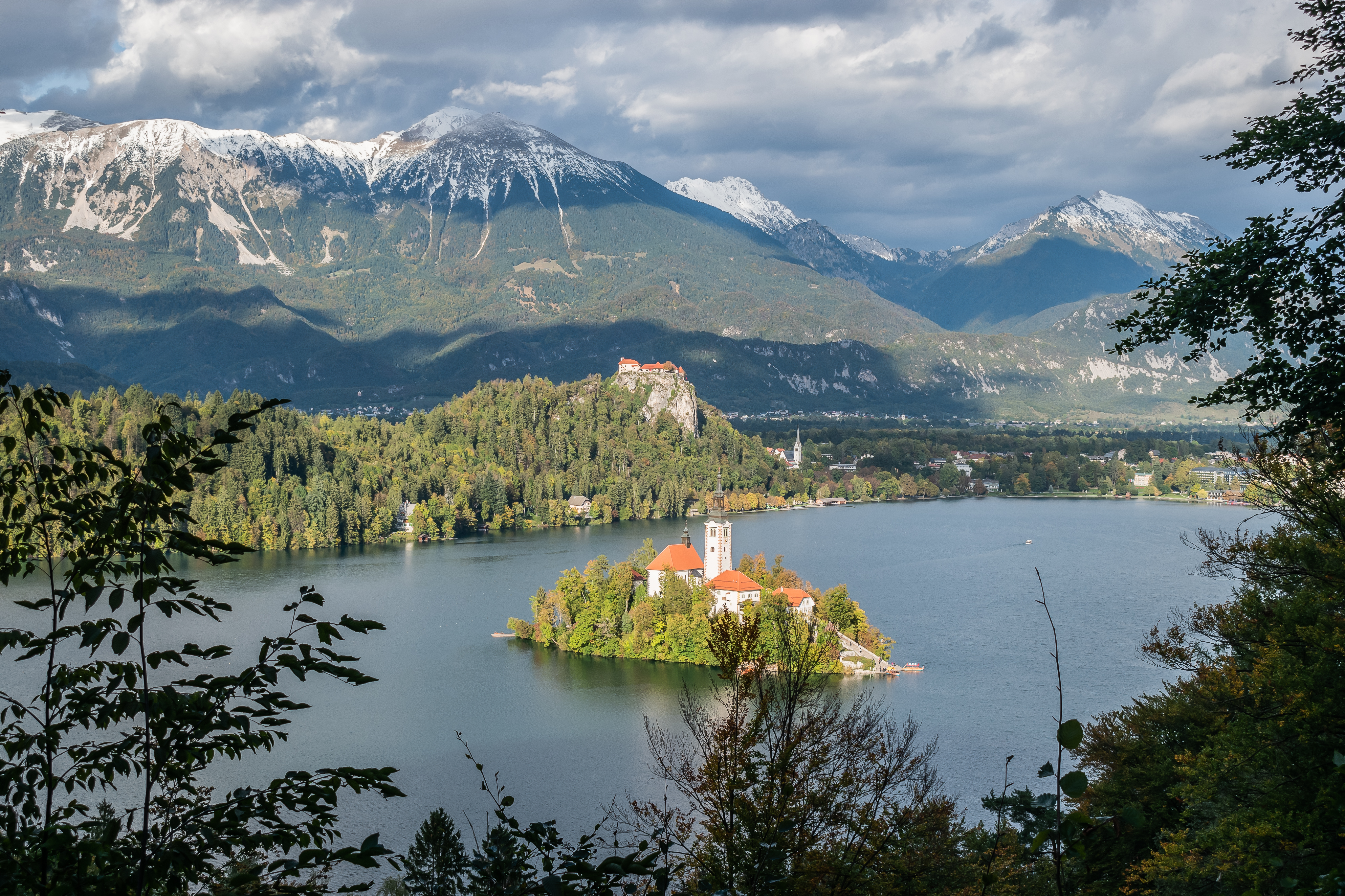Lake Bled with its island church is an iconic symbol of Slovenian tourism.