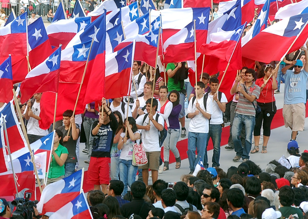 Chileans with flags of Chile.