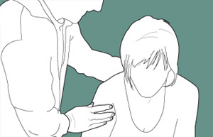 공황 발작을 겪고 있는 사람을 다른 사람이 안심시키는 모습