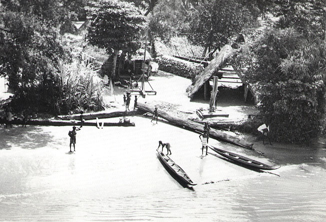 A Maroon village along the Suriname River, 1955, reflecting communities formed by descendants of escaped slaves.
