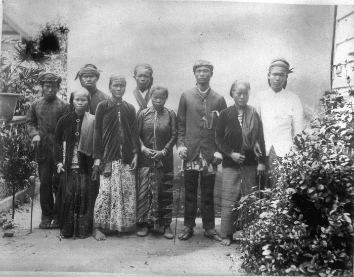 Javanese immigrants brought as contract workers from the Dutch East Indies, pictured between 1880 and 1900. This migration profoundly shaped Suriname's demographic landscape.