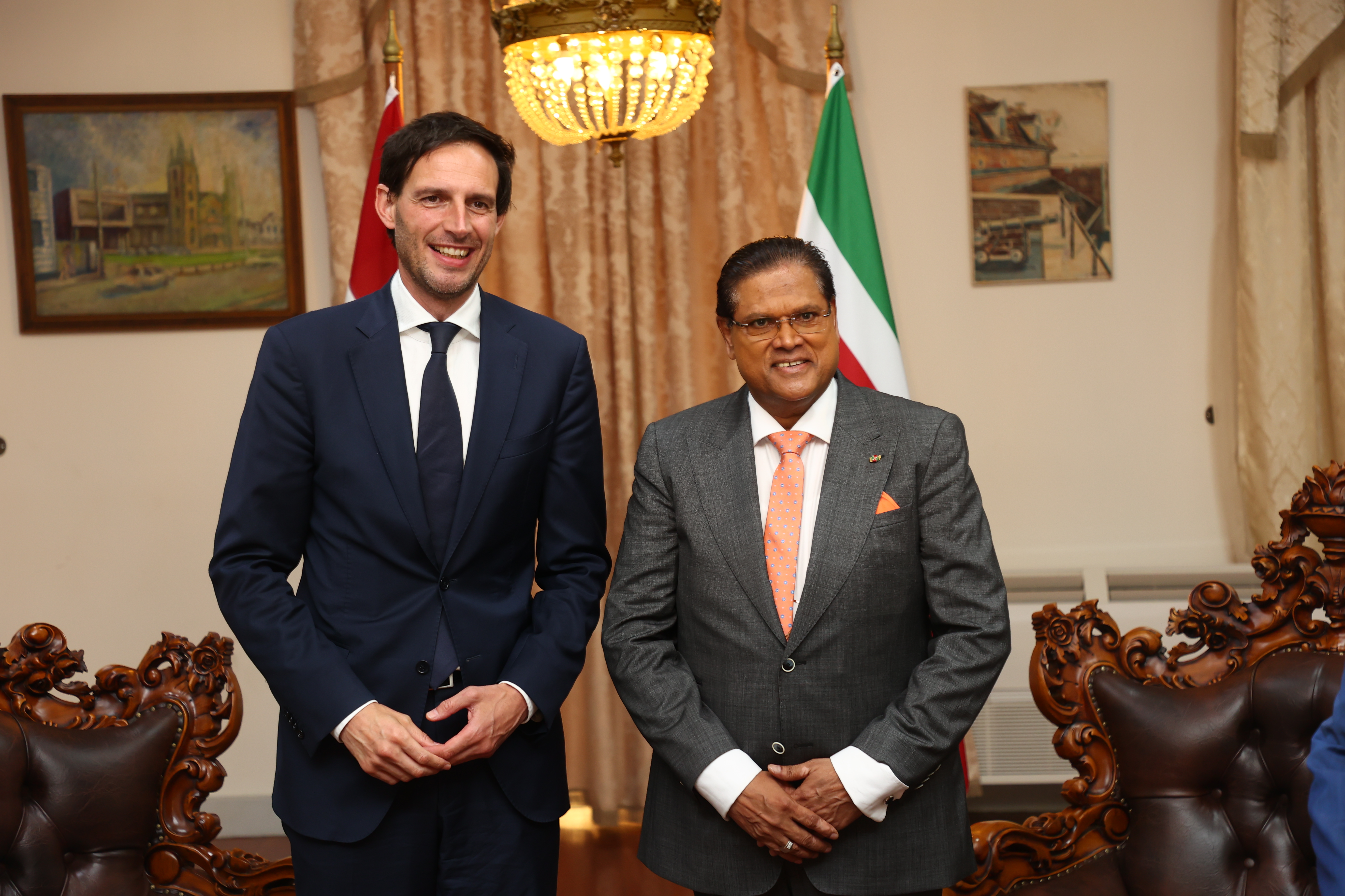 President Chan Santokhi (right) with Dutch politician Wopke Hoekstra in Paramaribo for Ketikoti 2023, symbolizing the complex but enduring relationship with the Netherlands.