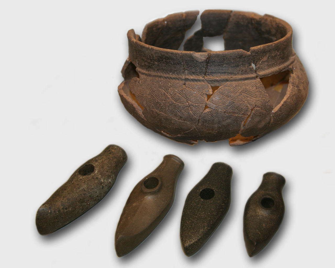 Corded Ware pottery and axes from around 2000 BC, displayed at the Estonian History Museum.