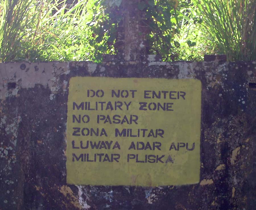 A sign in Bluefields in English (top), Nicaraguan Spanish (middle), and Miskito (bottom), reflecting the linguistic diversity of the Caribbean coast.