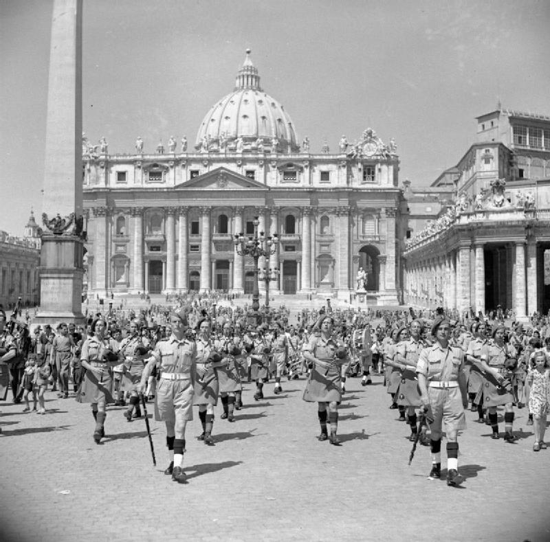 Musicians of the British Army's 38th (Irish) Brigade playing in front of St. Peter's Basilica in June 1944