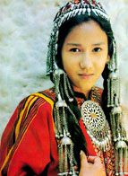 A Turkmen girl in traditional national dress.
