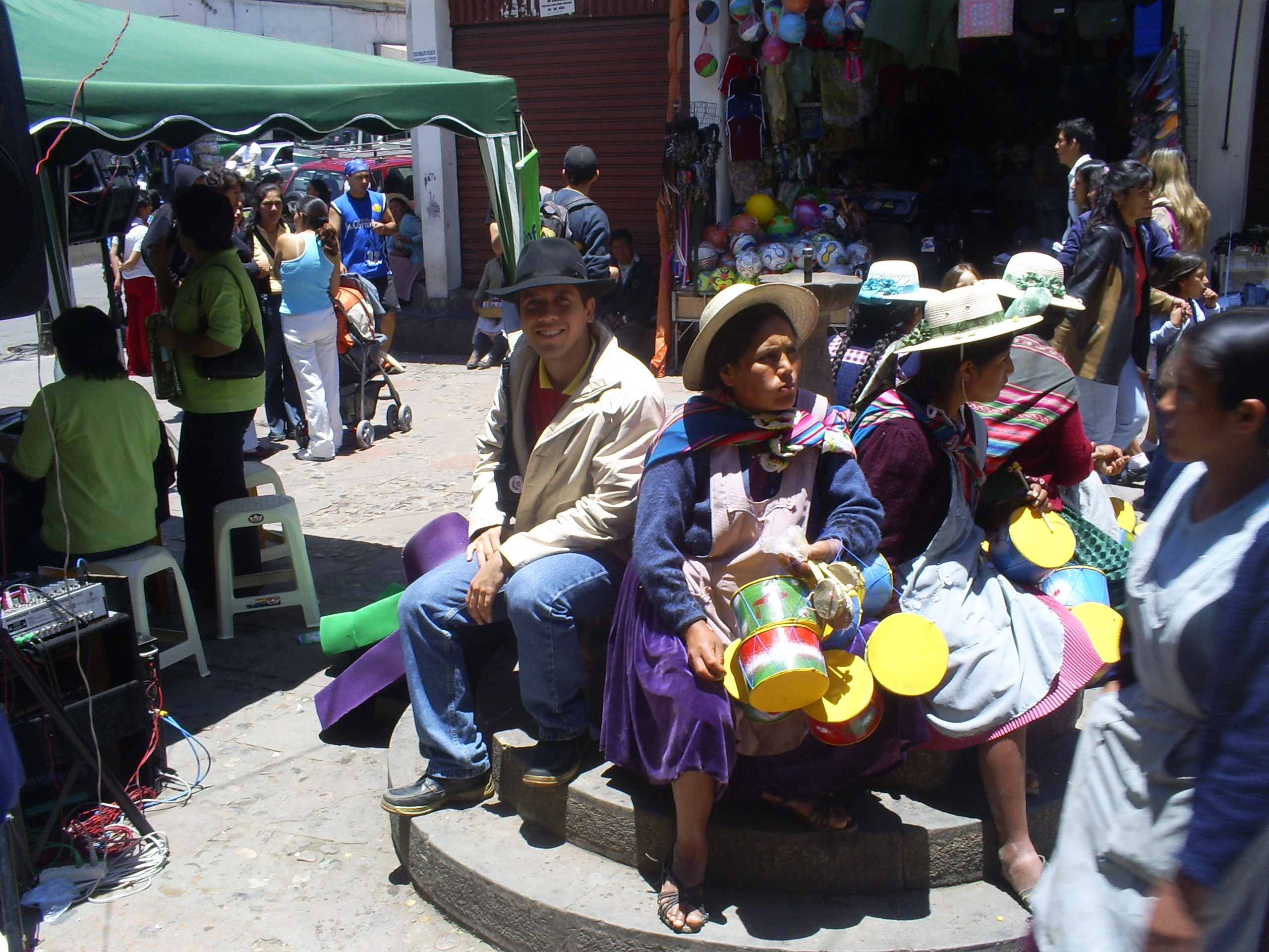 People in the bustling city center of La Paz, reflecting Bolivia's urban population.