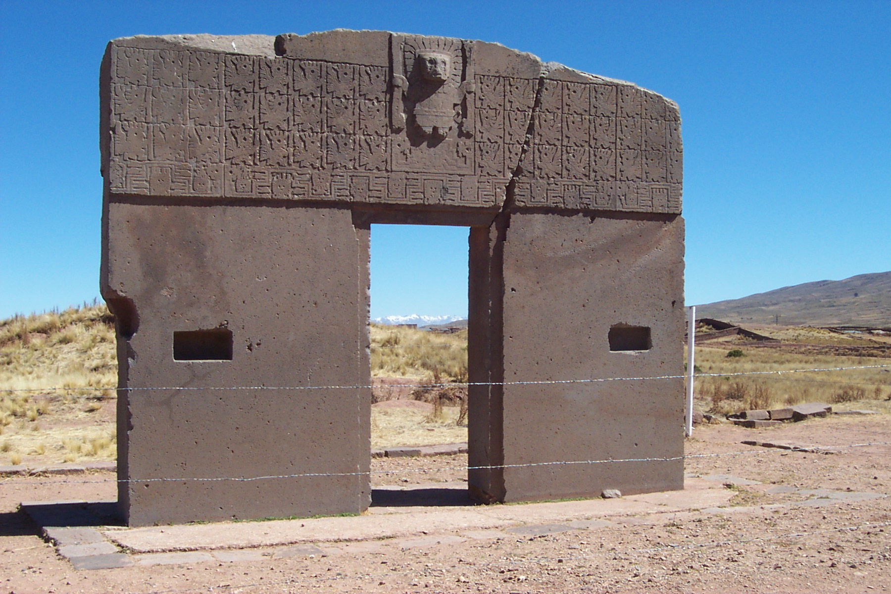 The Gate of the Sun at Tiwanaku, a pre-Columbian monolithic structure reflecting ancient Andean cosmology and artistry.
