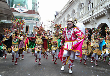 Dancers in elaborate costumes performing the Diablada during the Carnival of Oruro, a major cultural and religious festival.