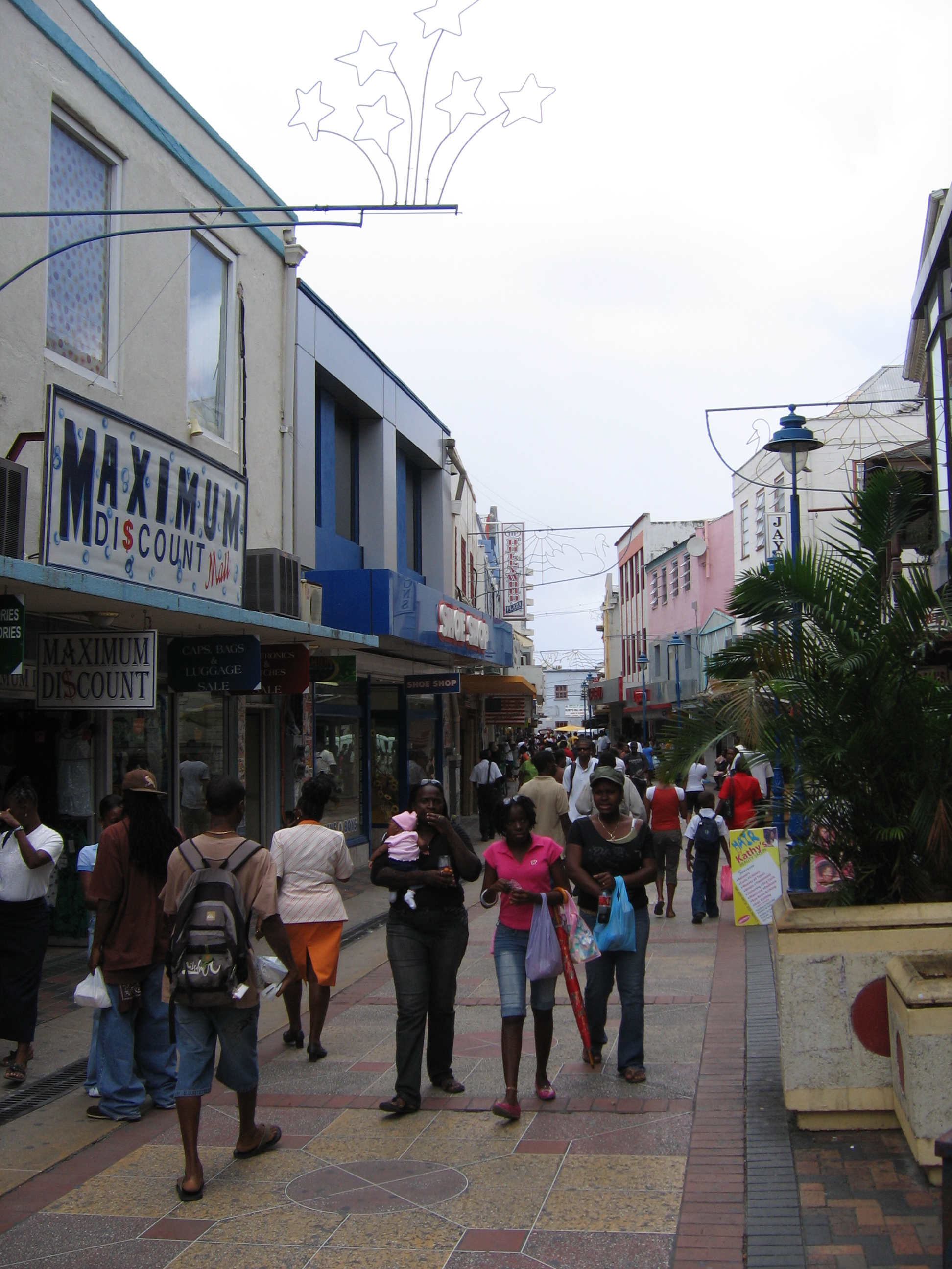 People shopping in the capital city of Bridgetown.