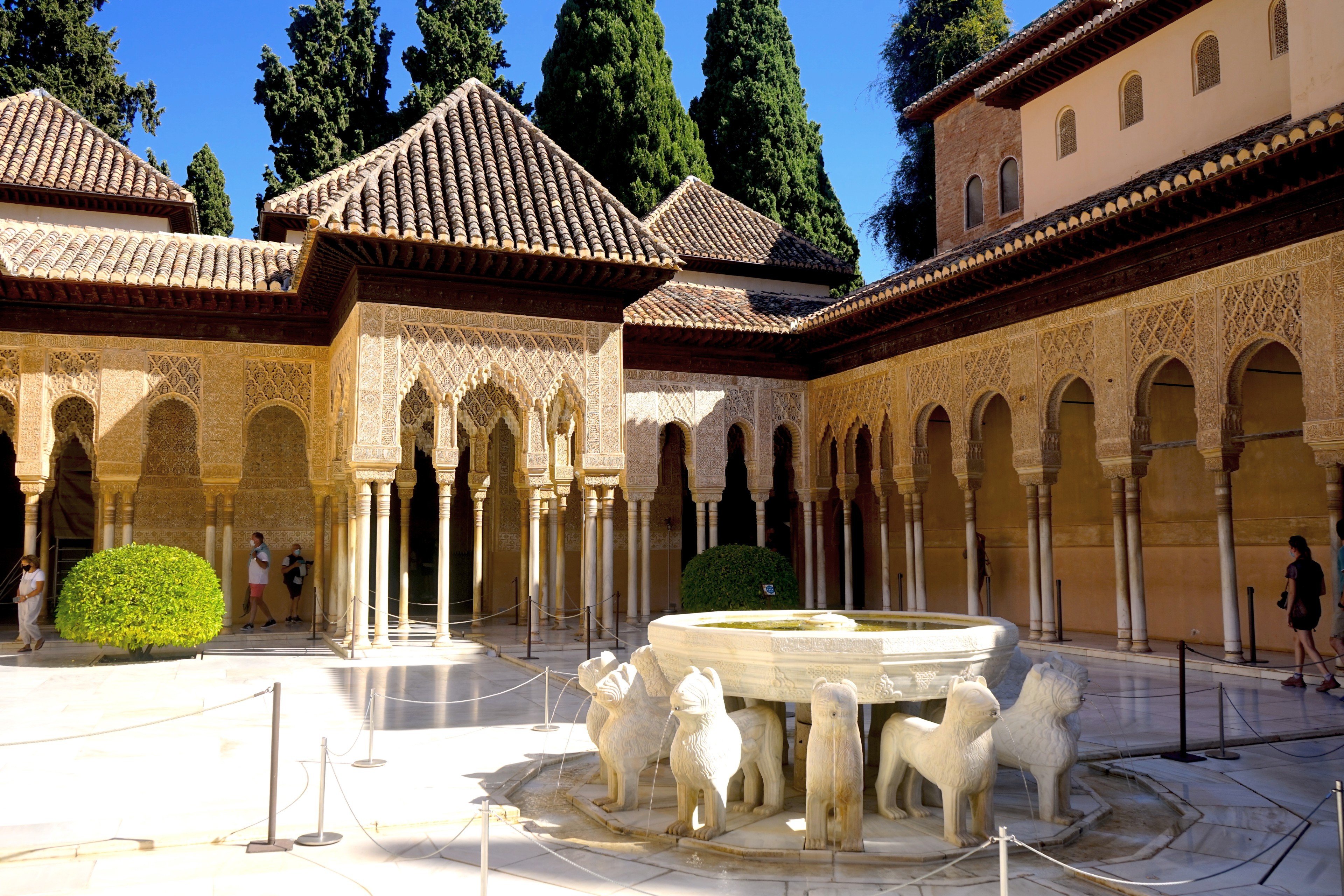 The Court of the Lions and its central fountain in the Alhambra complex, Granada, a masterpiece of Nasrid architecture.