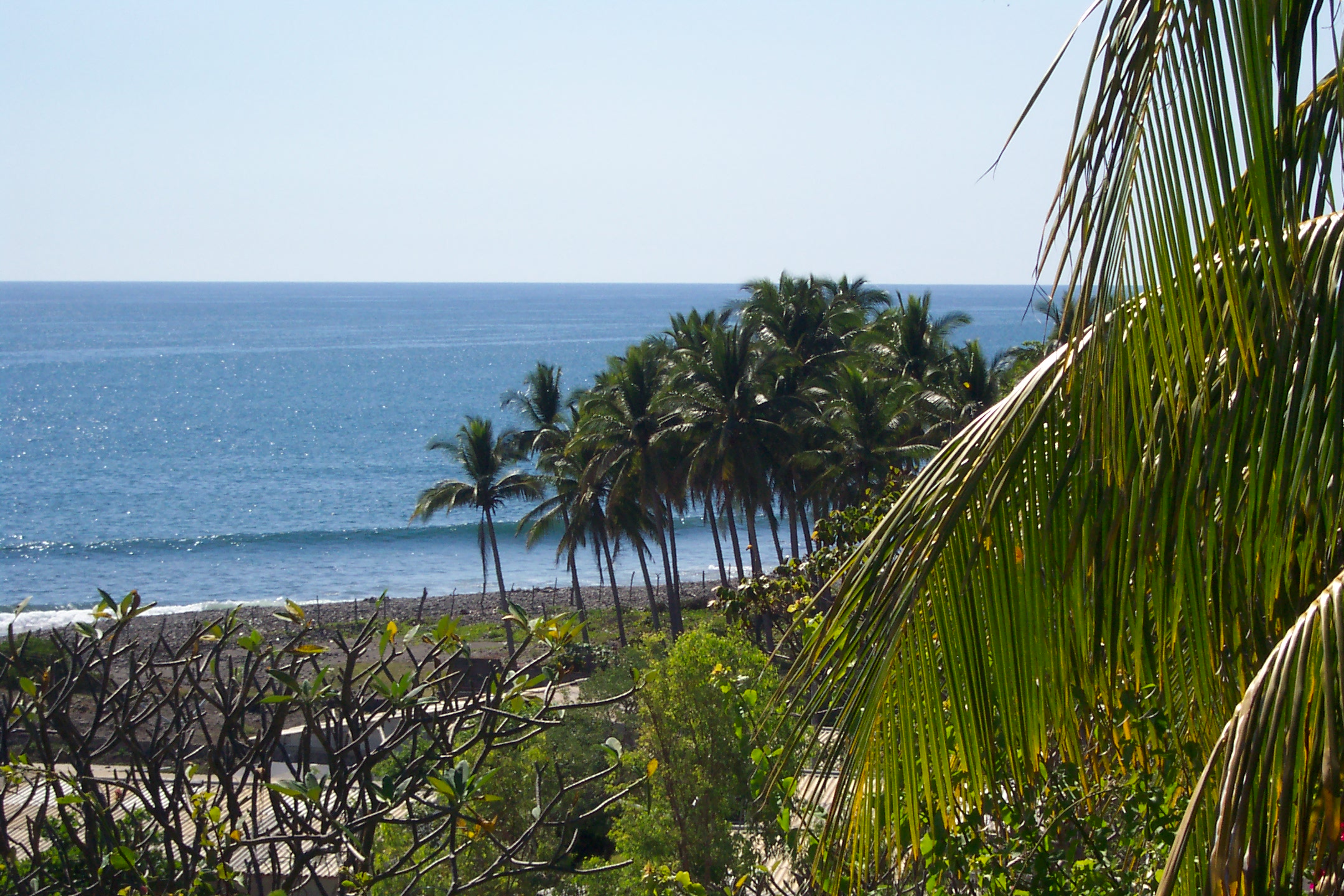 A tropical beach in La Libertad, a popular destination for surfing and coastal tourism in El Salvador.