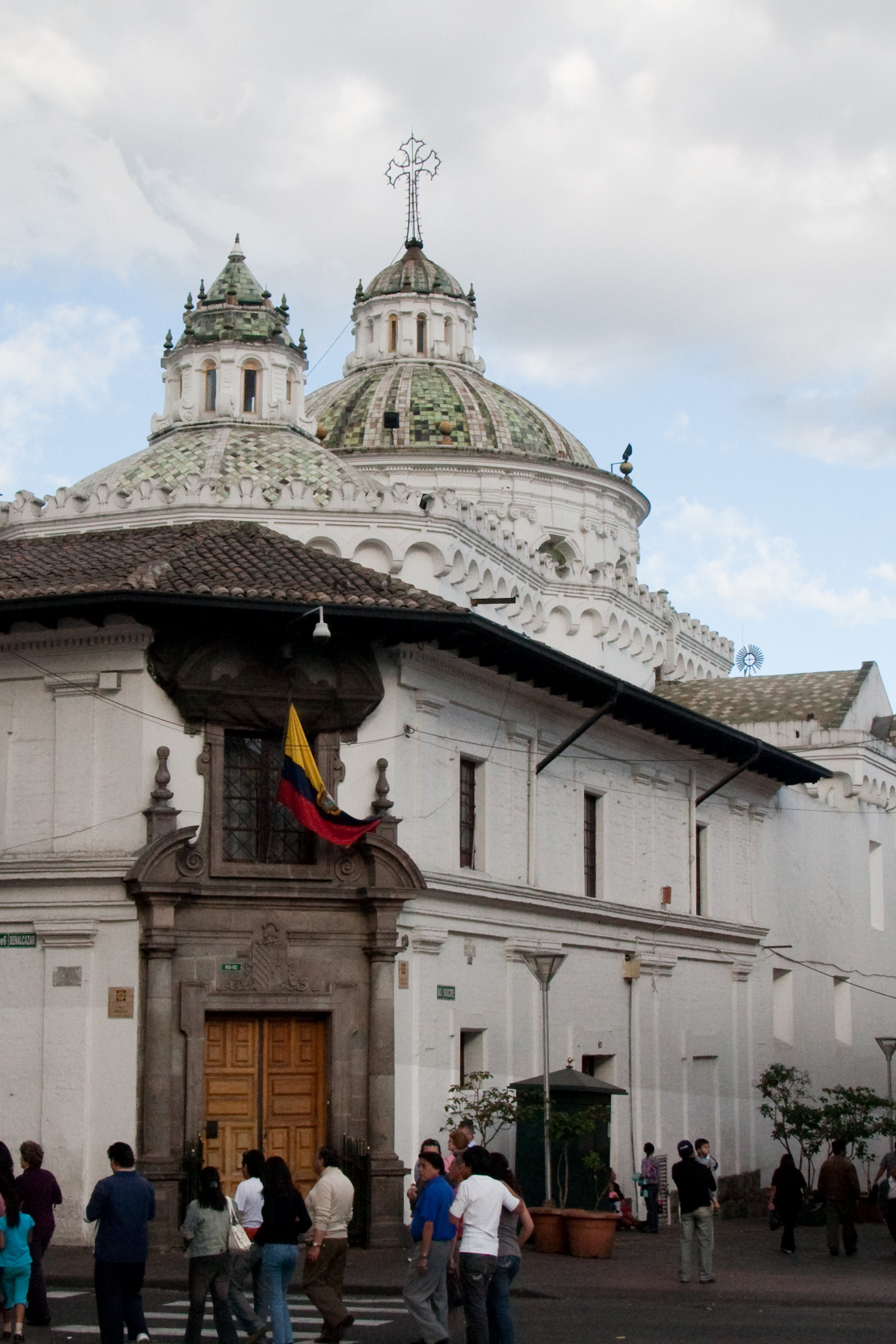 The highly ornate interior of the Church of La Compañía in Quito, a prime example of Spanish Baroque and a testament to the historical influence of Catholicism.