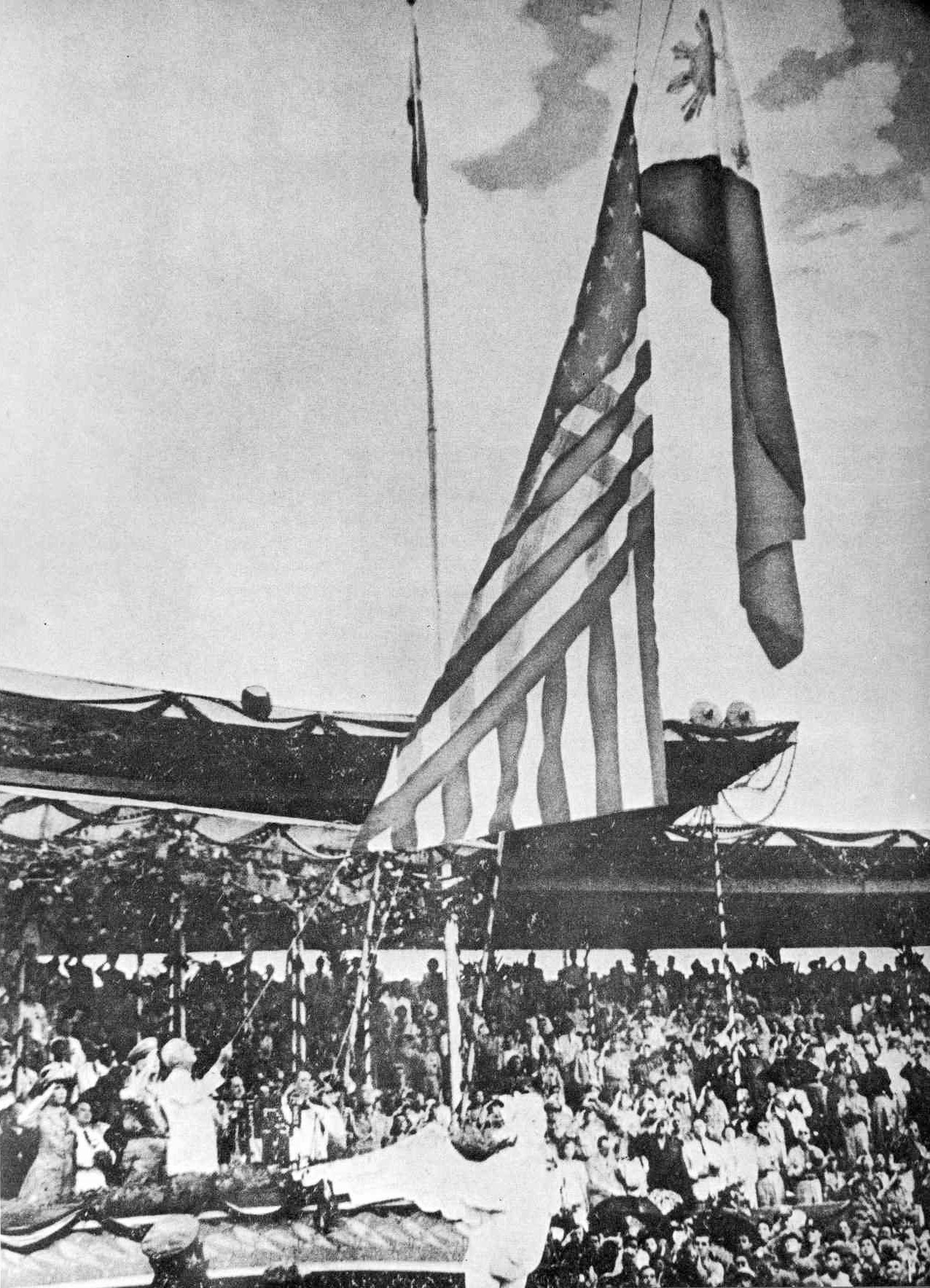 The raising of the Flag of the Philippines during the declaration of Philippine Independence on July 4, 1946, at the Independence Grandstand (now Quirino Grandstand) in Manila.