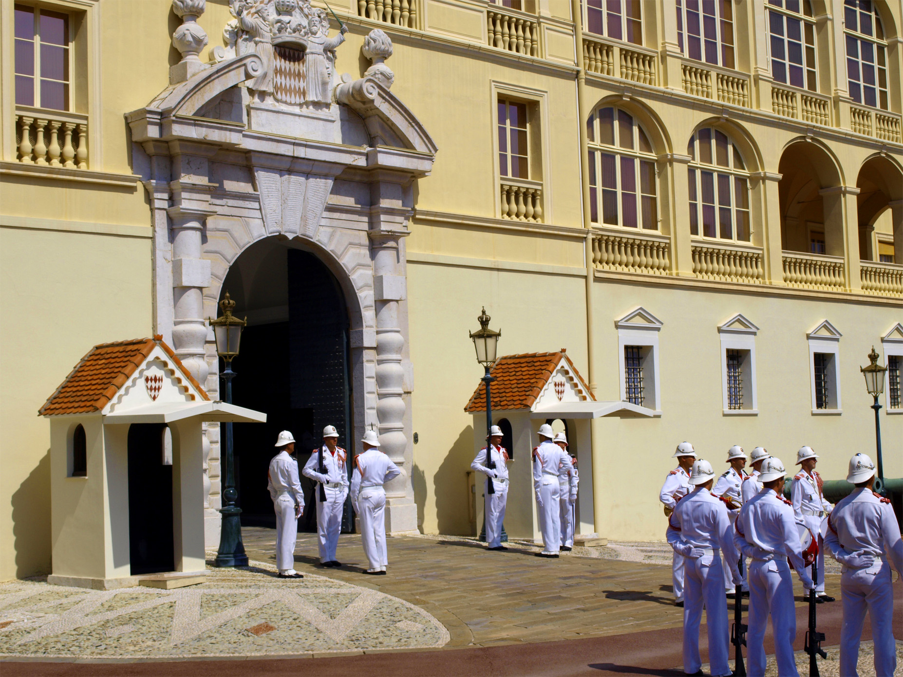 Palace guards in their summer uniform at the Prince's Palace of Monaco.