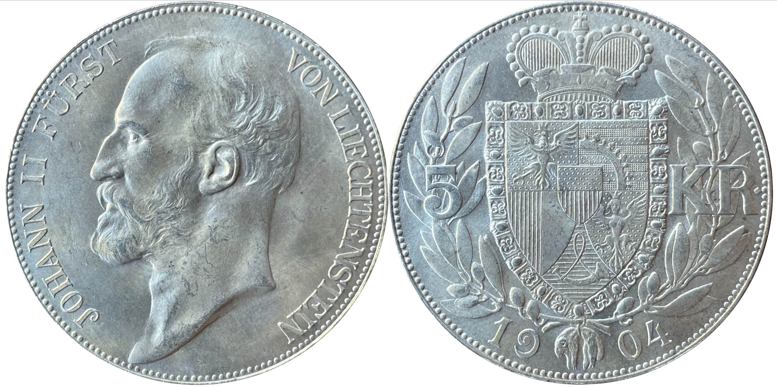 Đồng xu bạc: 5 kronen của Liechtenstein, 1904, mặt trước đồng xu là chân dung của Johann II