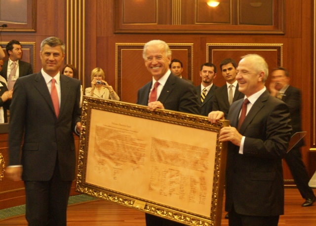 Hashim Thaçi (then Prime Minister of Kosovo), Joe Biden (then U.S. Vice President), and Fatmir Sejdiu (then President of Kosovo) with a copy of Kosovo's Declaration of Independence.