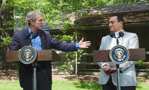 Former President Hosni Mubarak with former US President George W. Bush at Camp David in 2002. Egypt has historically played a key role in Middle Eastern diplomacy, often in coordination with the US, though this relationship has been tested by human rights issues.