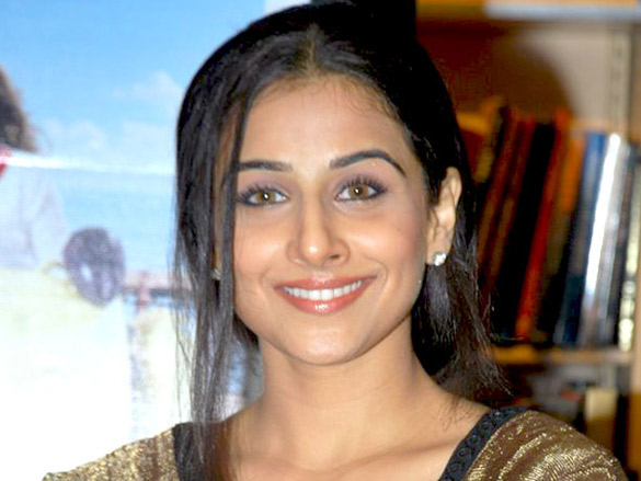 Vidya Balan is looking directly at the camera.