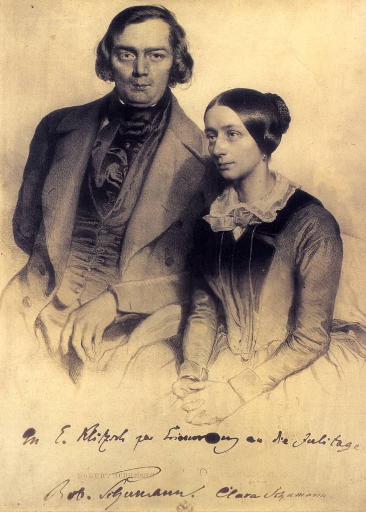 alt=Signed engraving of middle-aged white couple seated and looking towards the camera. The man is clean-shaven; the woman's dark hair is tied in a bun