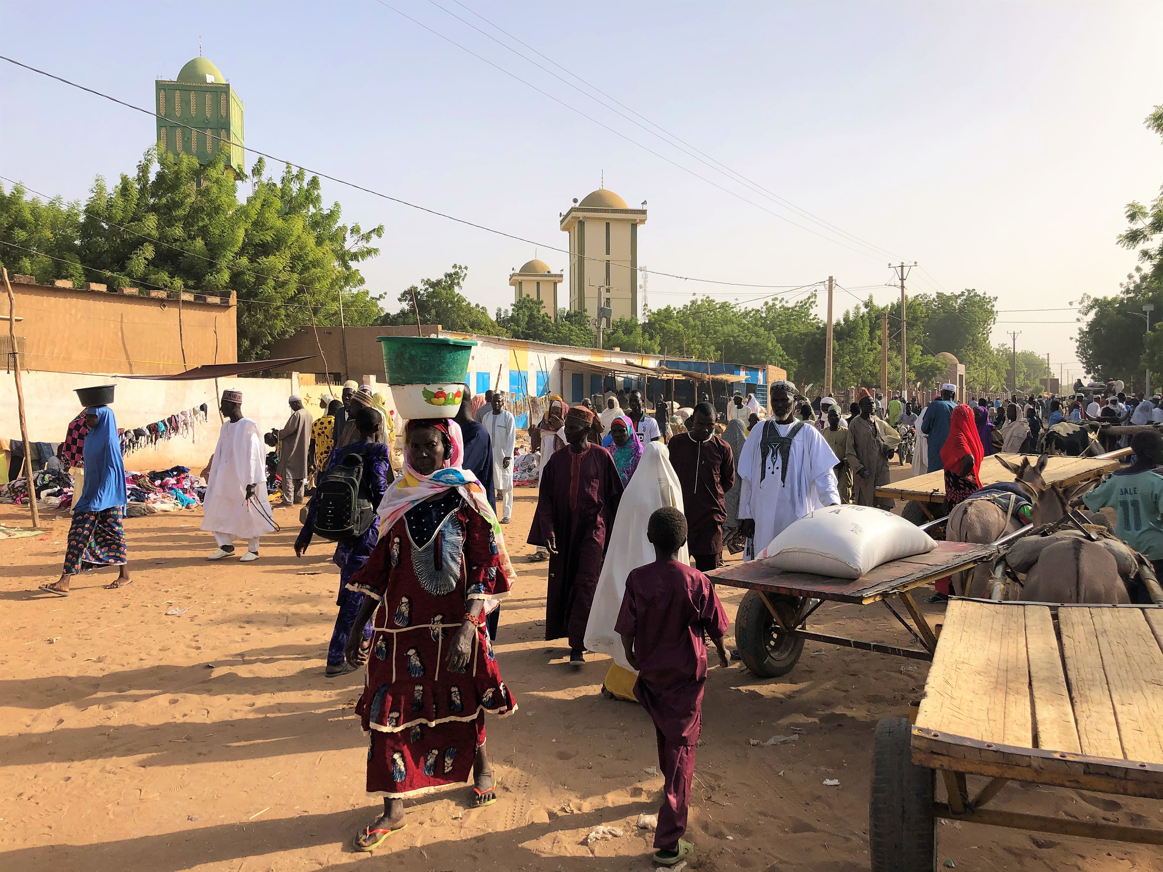 Worshipers leaving the grand mosque of Kiota after Friday prayers