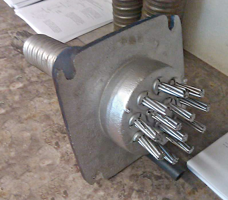 a detached anchor displaying tendon lock-offs