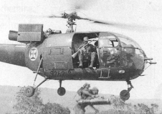 Portuguese paratroopers in a helicopter during the Portuguese Colonial War. The prolonged colonial wars had a devastating social and political impact, ultimately leading to the regime's downfall.
