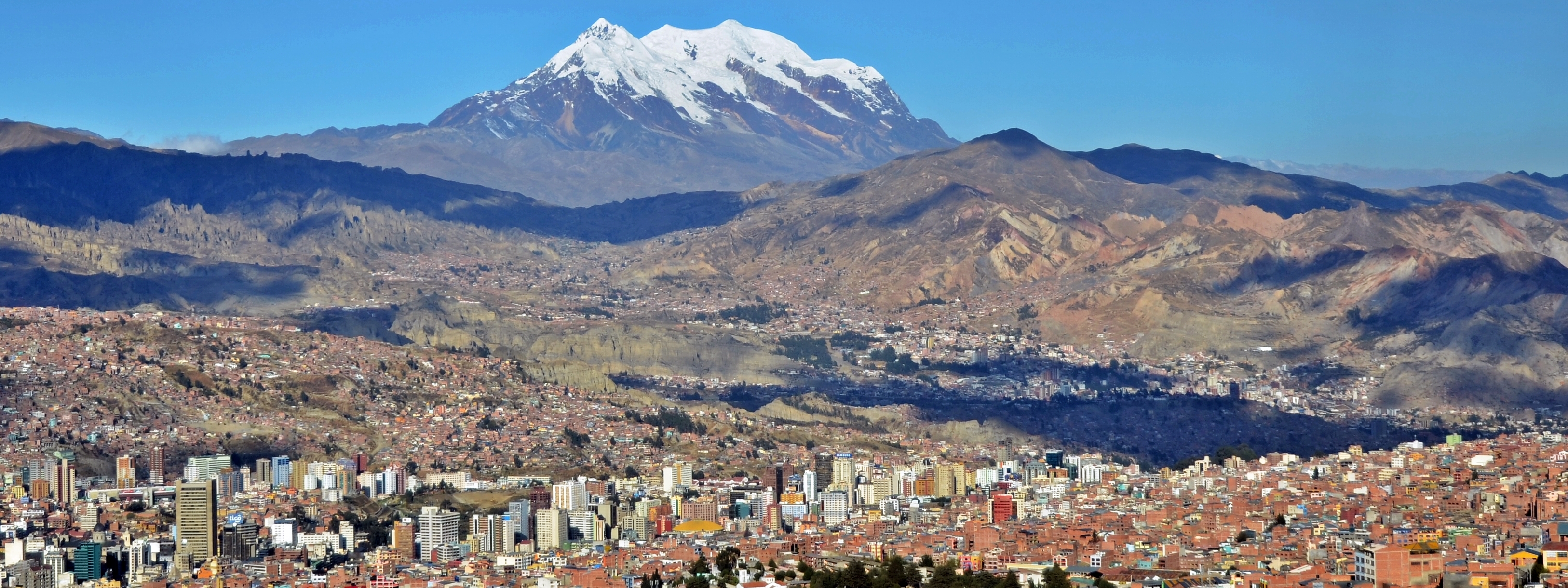 Mount Illimani overlooking La Paz, the capital city of the La Paz Department and the seat of government of Bolivia.