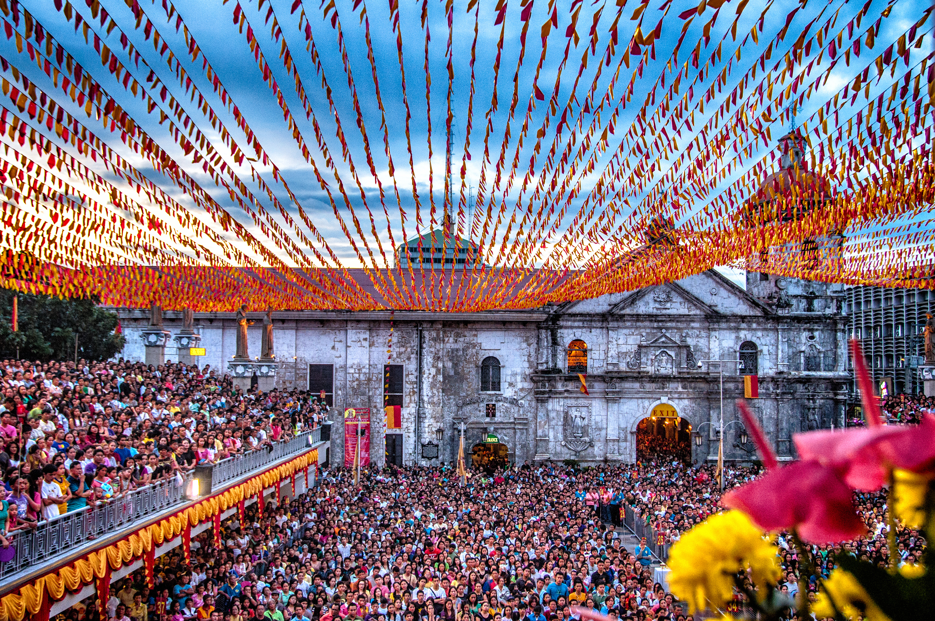 Catholics attend Mass at the Basilica del Santo Niño during the annual Sinulog Festival in Cebu City. This basilica houses the Santo Niño de Cebú, the oldest Christian religious relic in the Philippines.