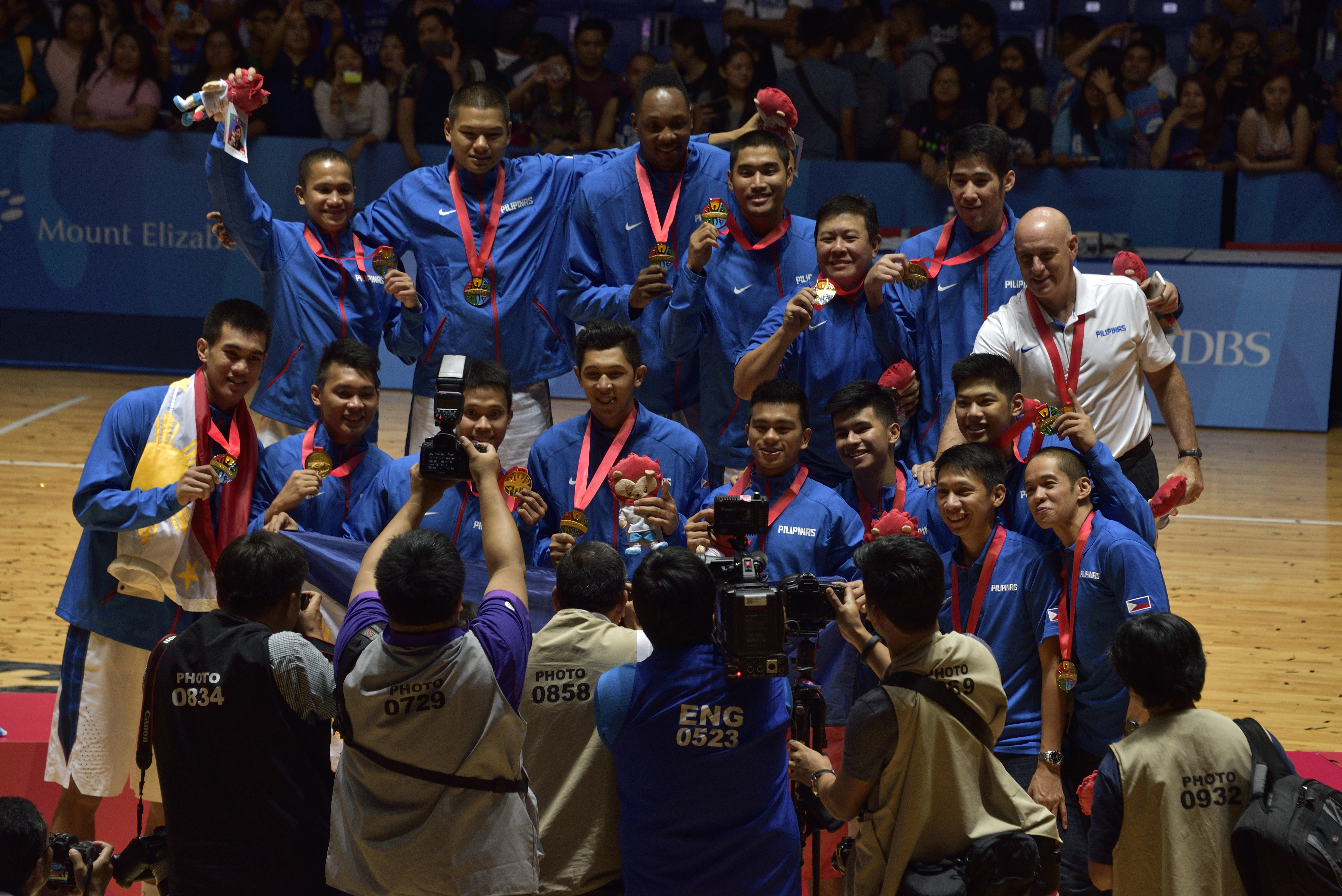 The Philippine men's national basketball team (Gilas Pilipinas) celebrating their championship at the 2015 Southeast Asian Games. Basketball is immensely popular in the country.