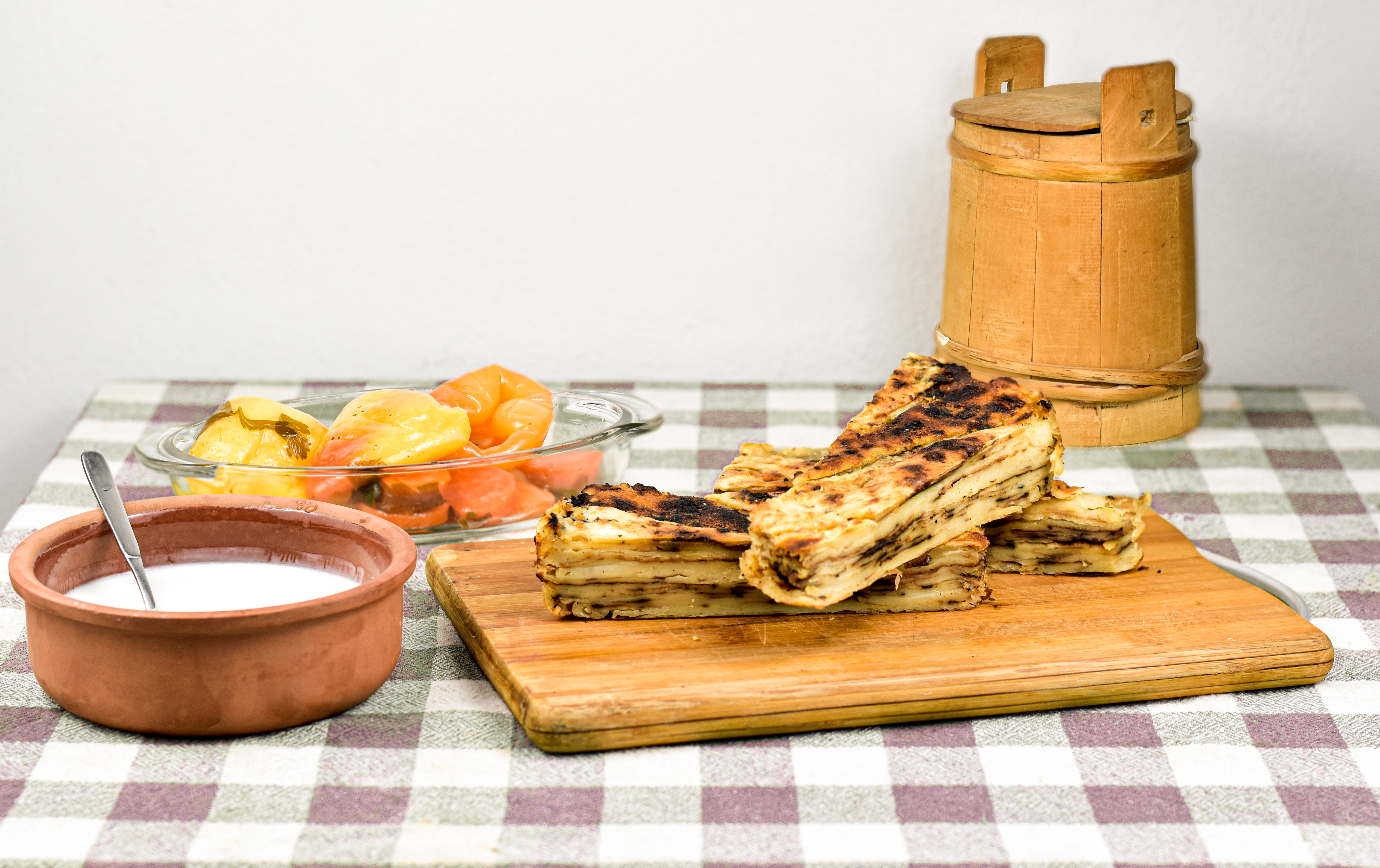 Fli, a traditional layered dish, is a staple of Kosovar Albanian cuisine, often prepared for special occasions.