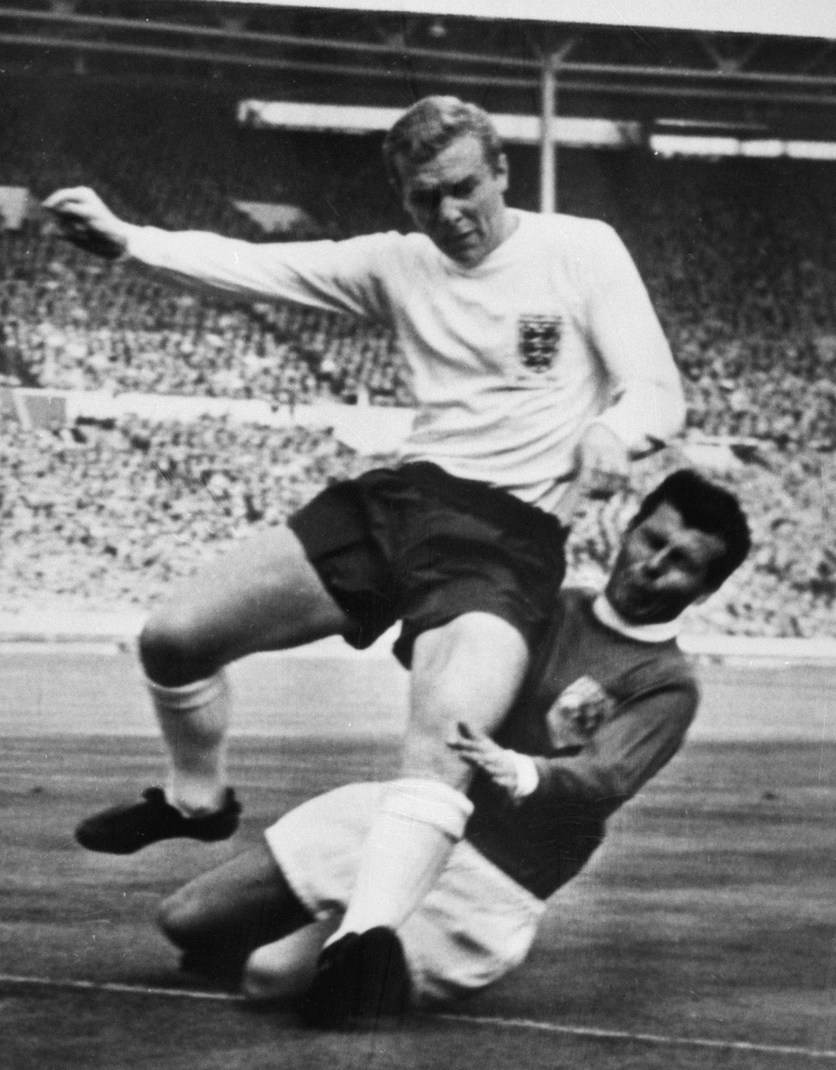 Moore (left) and Czech midfielder Josef Masopust at the 1963 England v Rest of the World match at Wembley