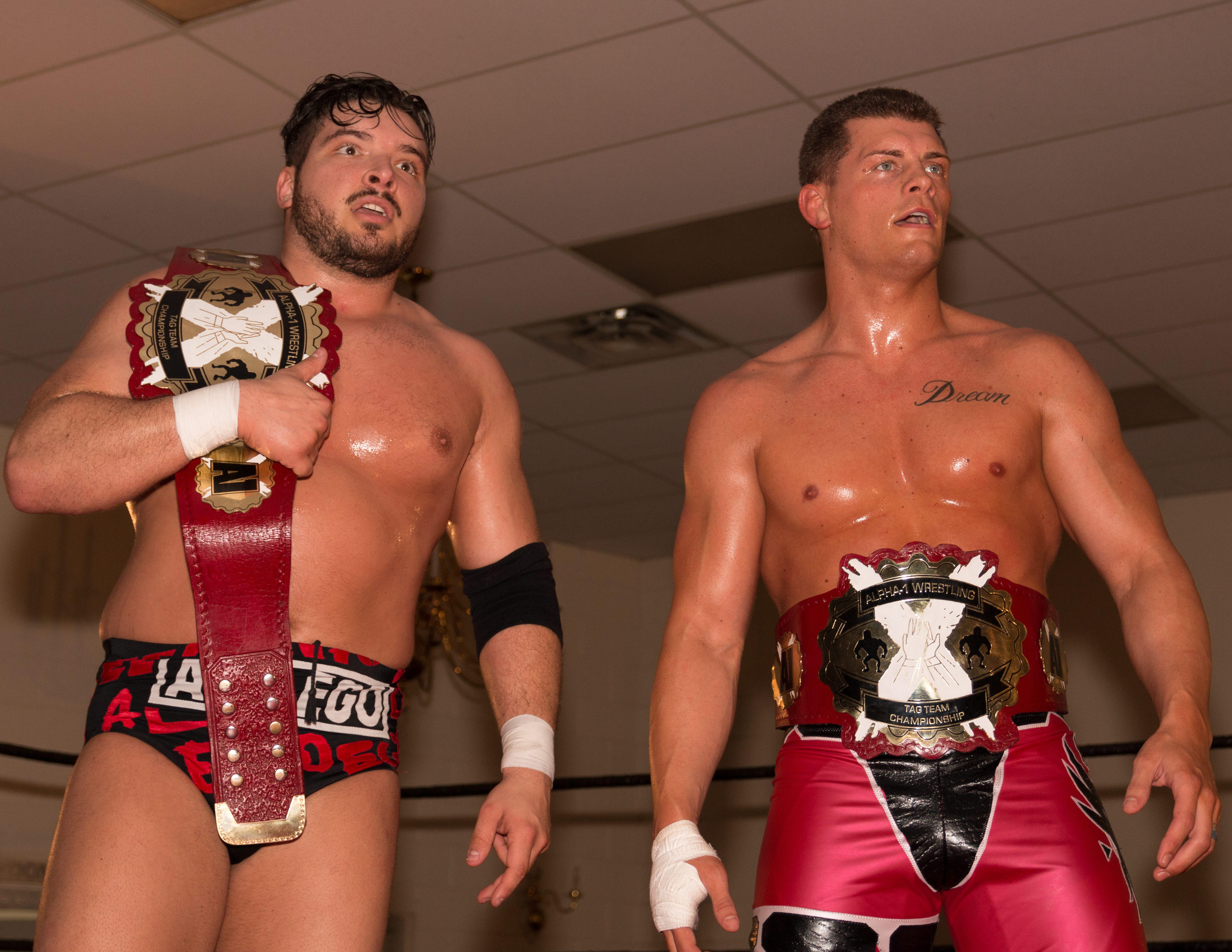 Page (kiri) dan Cody Rhodes (kanan) sebagai Juara Tim Tag Alpha-1 pada Juni 2017
